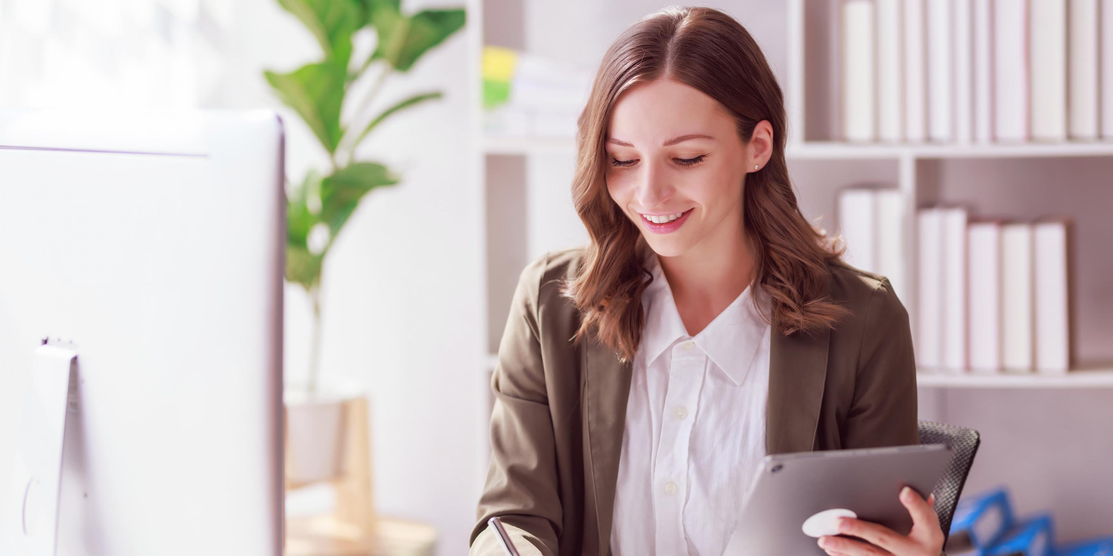 Financial analysis workspace with multiple monitors displaying market data and analytical charts