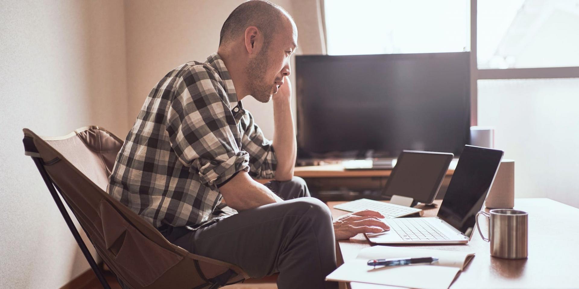 Financial analysis workspace with professionals reviewing market data